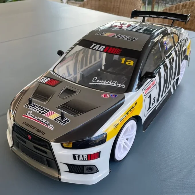 Купити Швидкісна машинка на радіокеруванні 1:10 Mitsubishi Evo Lancer 4x4 RC 70 - 40 км/год повноприводна за 1890 грн